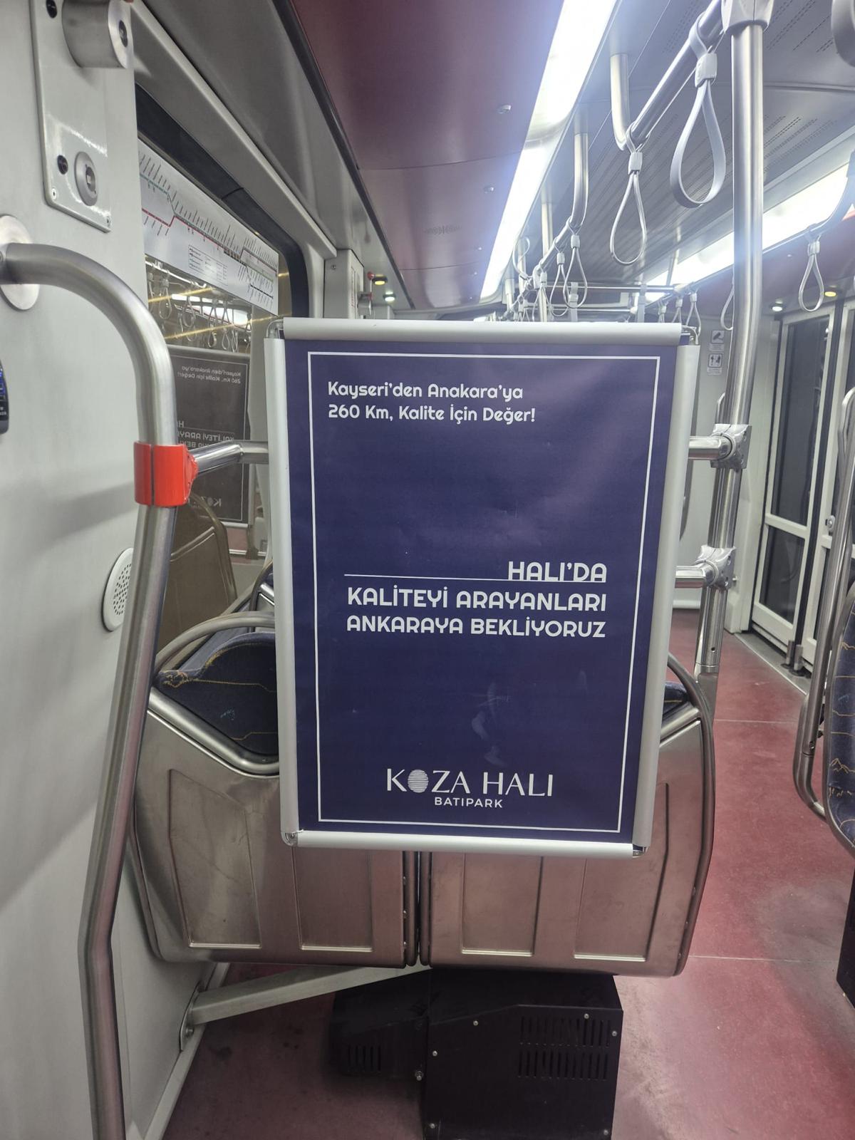 Koza Halı tramvay içi reklam panosu